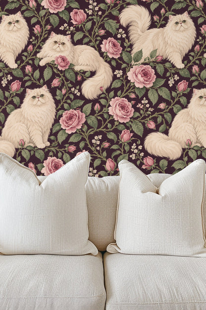 Artistic view of Persian cat faces and tails woven in rose branches on wallpaper