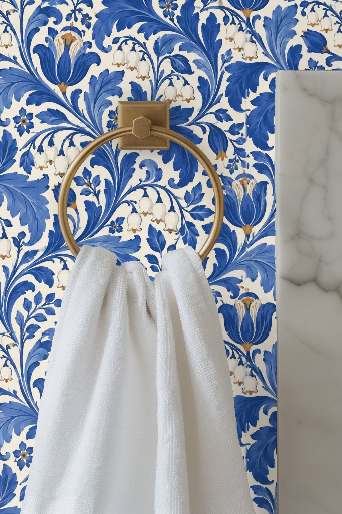Close-up of cobalt blue floral and lily of the valley motifs on ivory wallpaper background