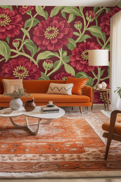 Close-up of wallpaper featuring large red zinnia flowers with green leaves on a dark red background