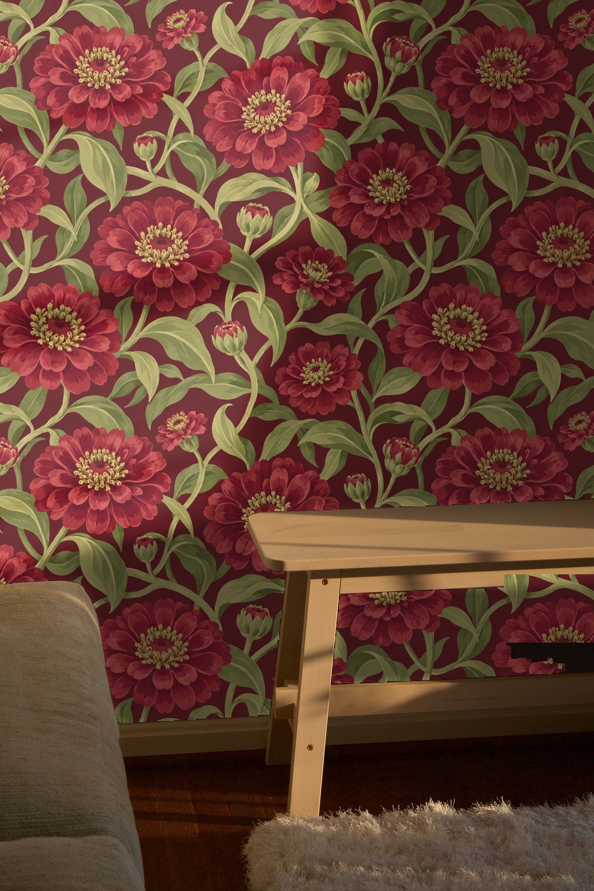 Close-up of floral bud detail with layered red petals on wallpaper
