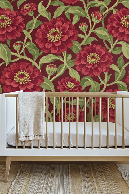 Red zinnia wallpaper paired with an orange couch and patterned rug in a cozy living room