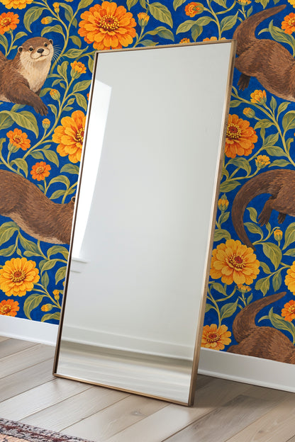 Pattern repeat of smiling otters amidst detailed floral foliage on bright blue background