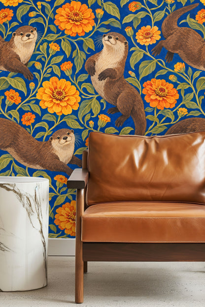 Close detail of an otter climbing a green leafy branch outlined against bold blue and orange flowers