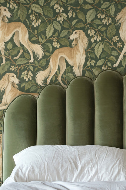 Wallpaper artwork showing elegant golden Saluki dogs among dense green leaves and clusters of cream flowers