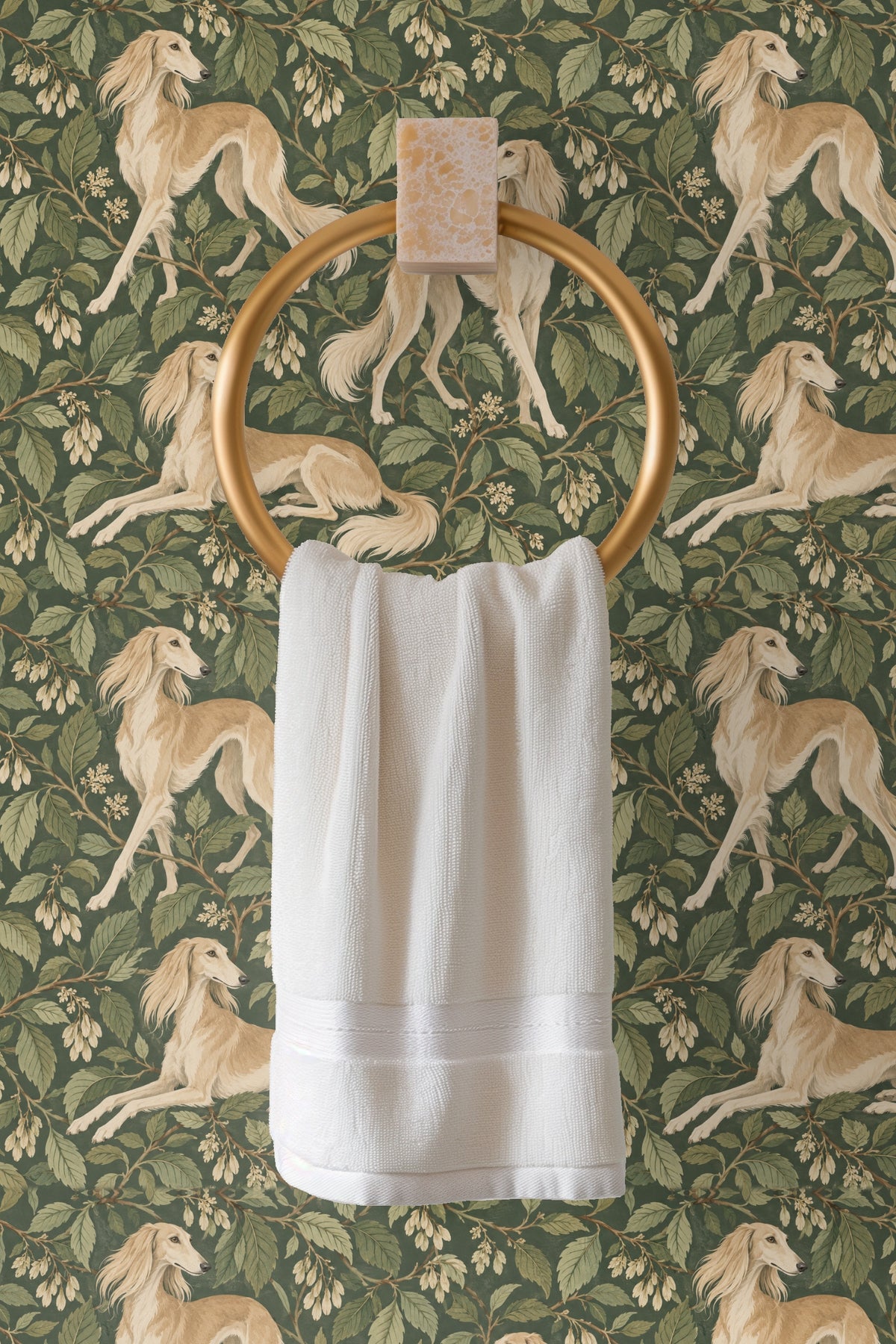 Detail of elegant Saluki dog walking on the wallpaper with green foliage and flowering branches