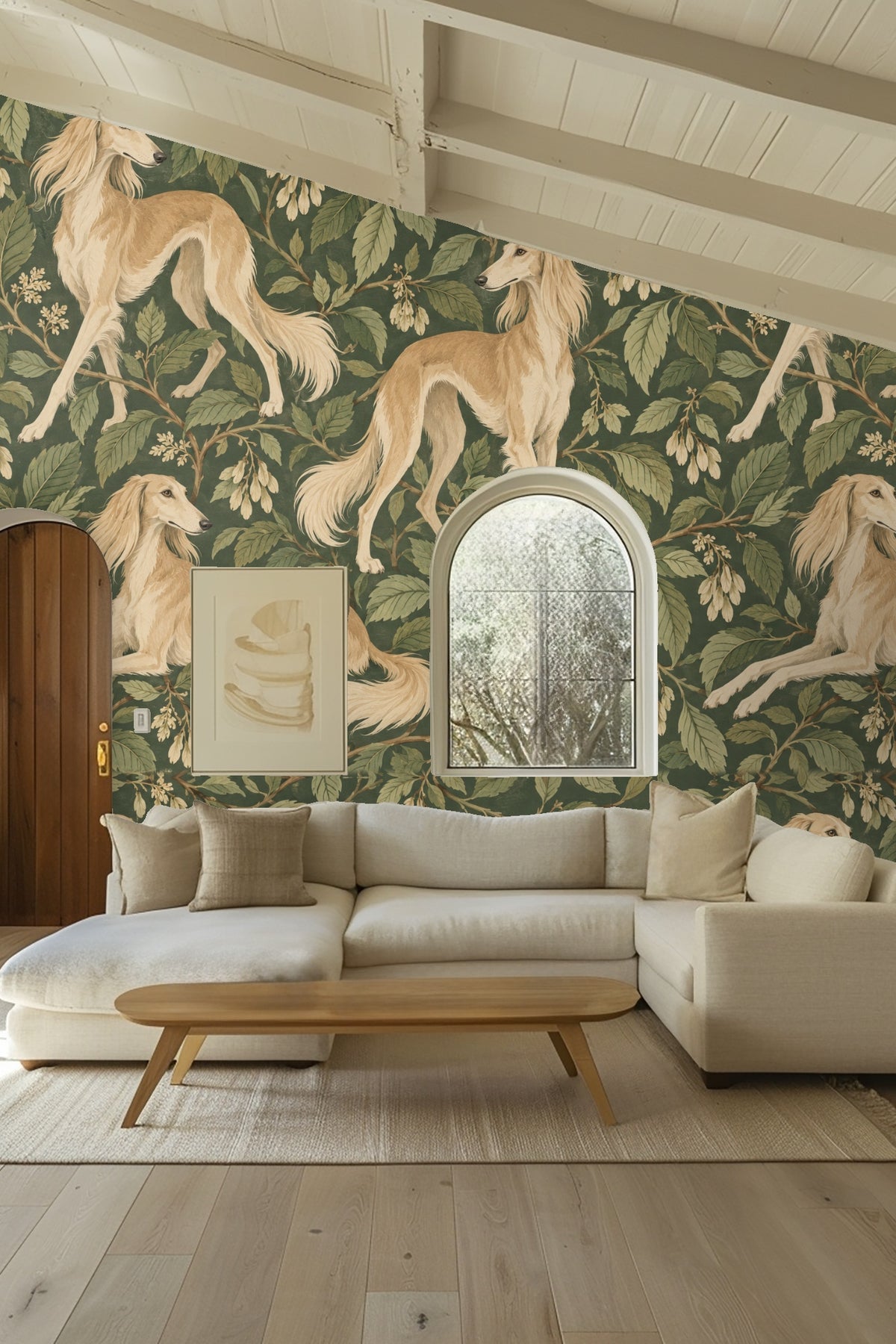 Soft cream flowers hanging alongside detailed green leaves on wallpaper