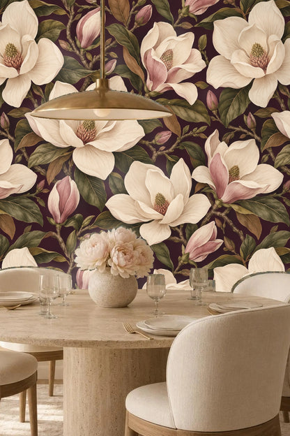 Entryway with an arch framing a round mirror reflecting plum magnolia floral wallpaper