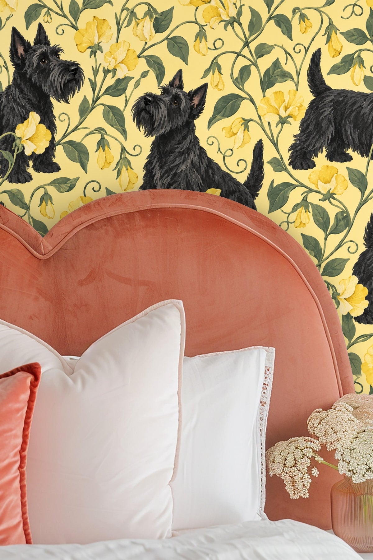 Detailed view of black Scottish Terriers among yellow sweetpea flowers on wallpaper