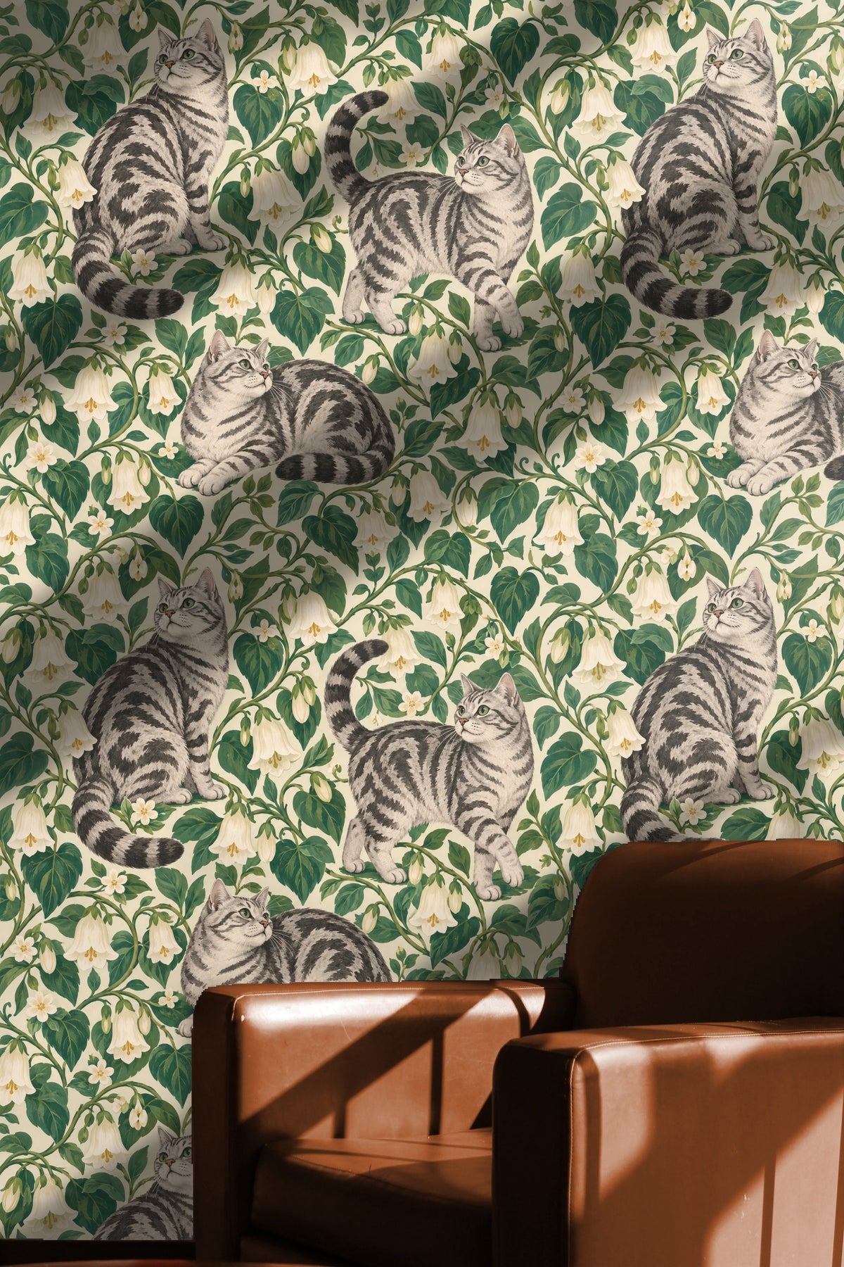 Room setting showing natural light illuminating wallpaper with tabby cat motif and white flowering vines.