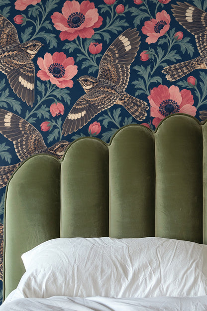 Detail of Night Flight Anemone wallpaper showing three flying nightjars among coral-pink anemone flowers on navy