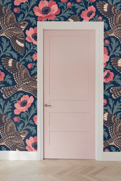 Wallpaper in setting with velvet furniture complementing color palette