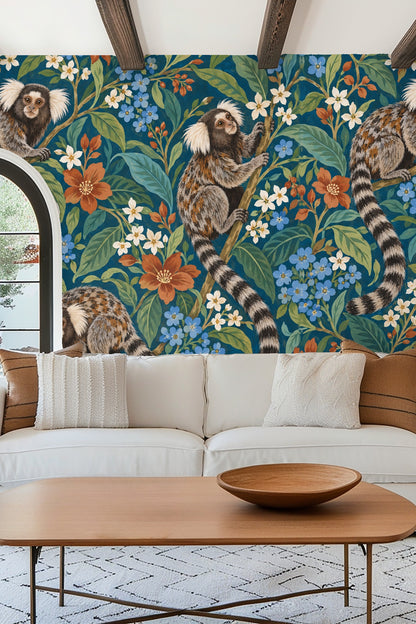Living room styled with vibrant marmoset floral wallpaper, orange sofa, and warm décor