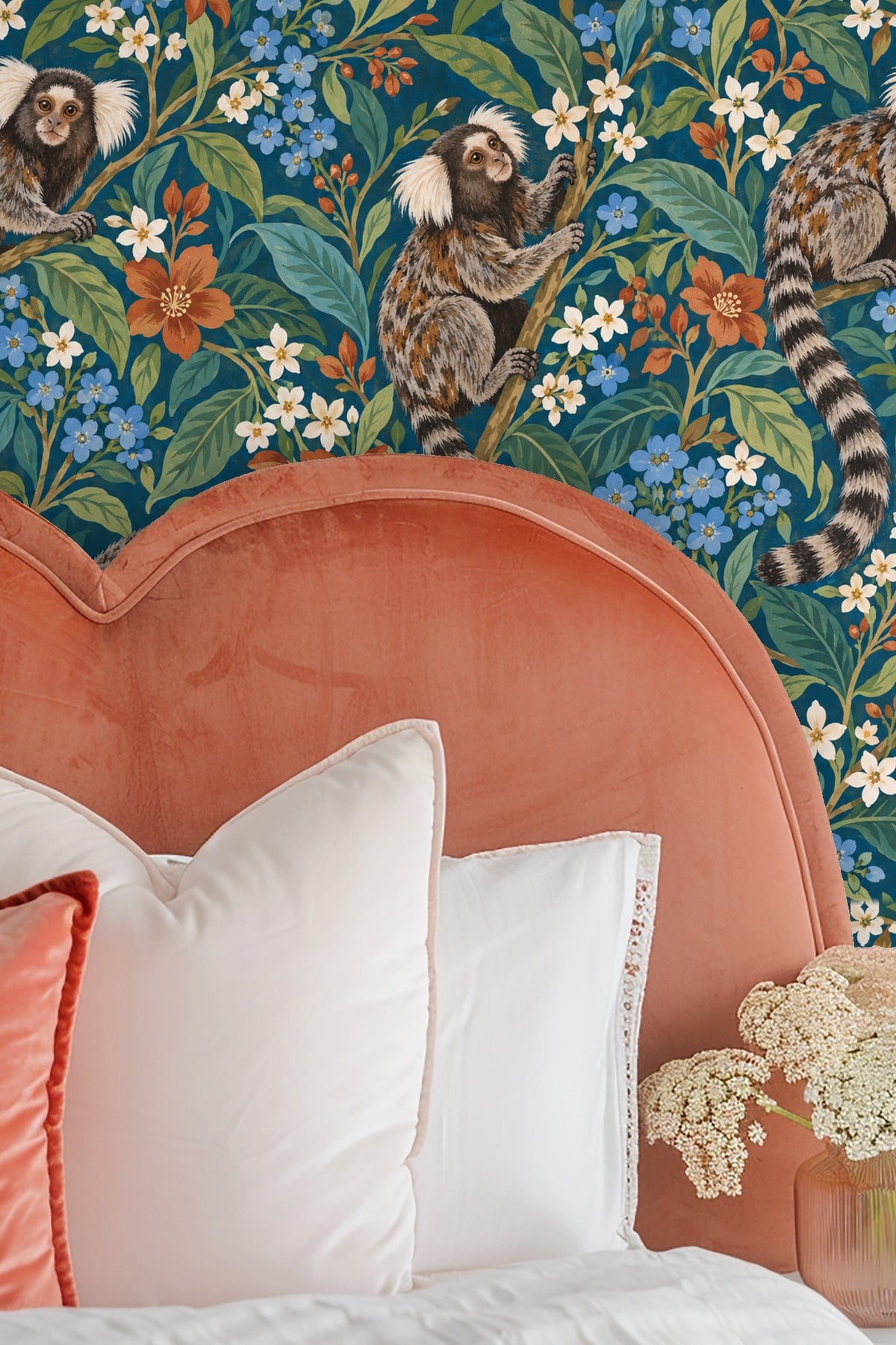 Wide angle of wallpaper showing three marmosets and balanced floral pattern