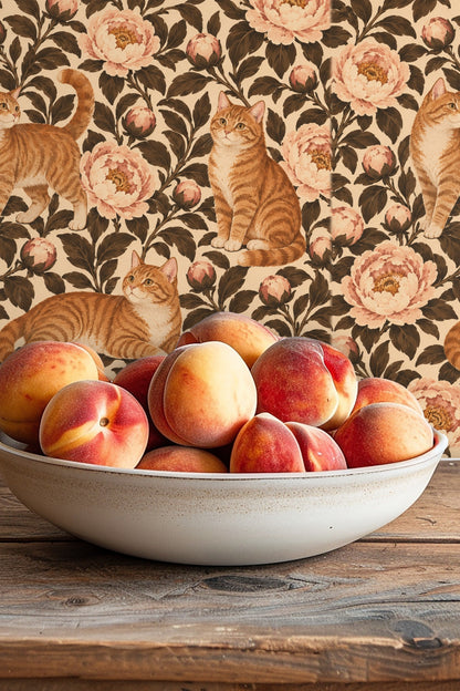 Striped tawny cats with expressive faces positioned between large blush peony blooms