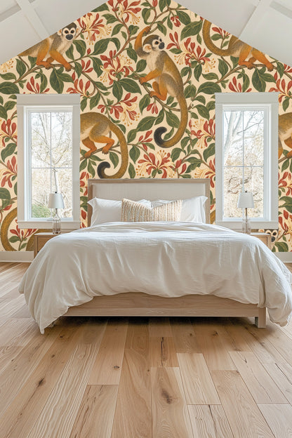 Entryway alcove wall covered with Honeysuckle Monkey Curls wallpaper featuring monkeys and honeysuckle flowers around a circular mirror and 