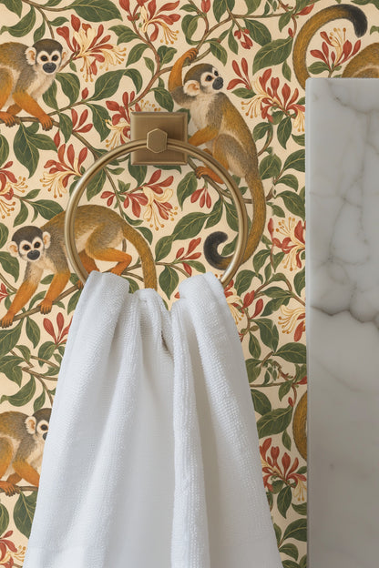 Close-up detail of a monkey’s expressive face and textured fur amid honeysuckle leaves and flowers from the Honeysuckle Monkey Curl wallpap