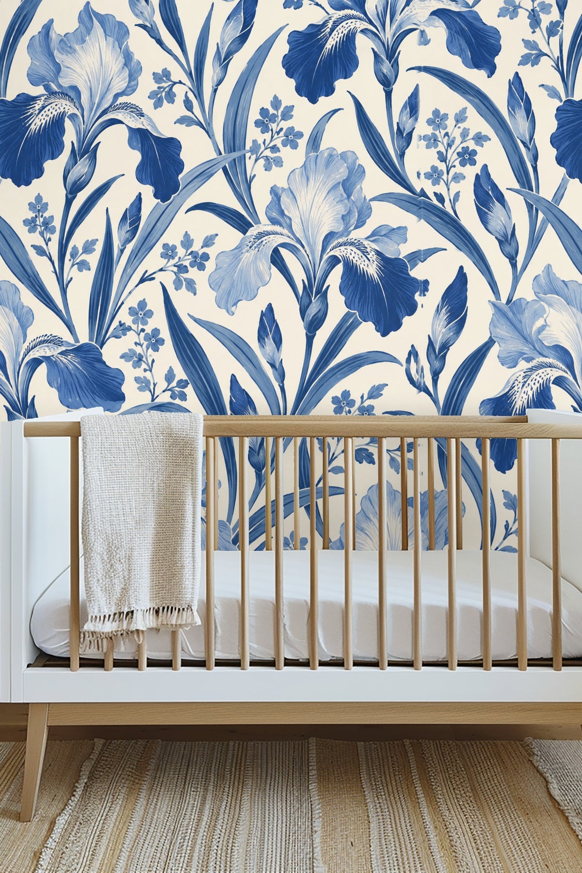 Detail of single large iris flower in varying shades of blue on cream ground
