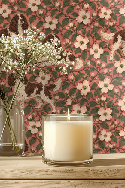 Wallpaper artwork showing three springer spaniels among dogwood flowers on a rose pink background