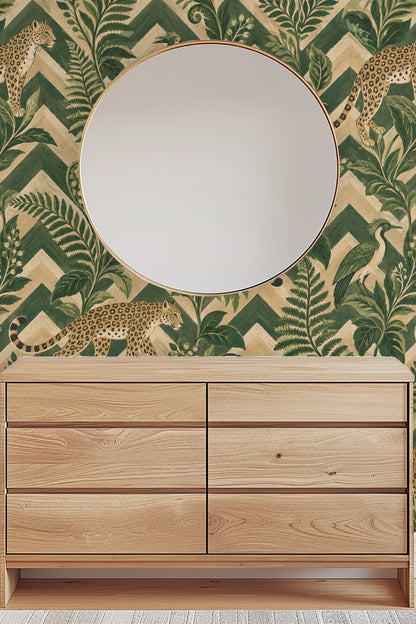 Bathroom detail with gold wall sconce, mirrored wall, and botanical wallpaper.