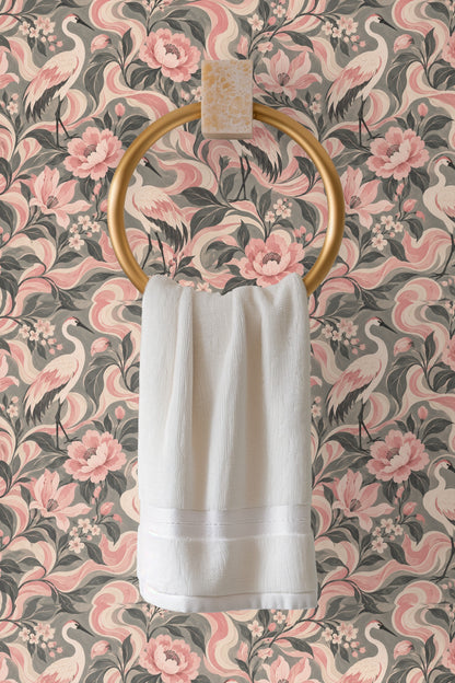 Arrangement of small pink buds and flowers balanced by larger floral forms in muted pink and gray tones