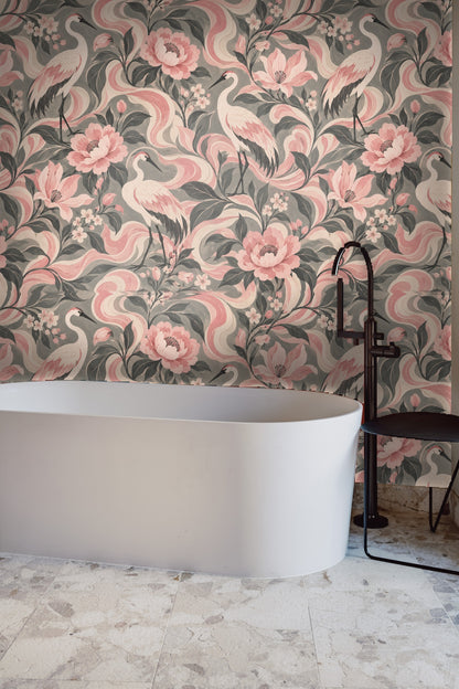 Soft pink cranes with detailed feathers amidst swirling pink and gray botanical tendrils on wallpaper