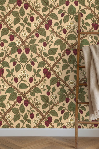 Detailed flat view of Mulberry Trellis wallpaper pattern with raspberry, leaves and lattice on beige.