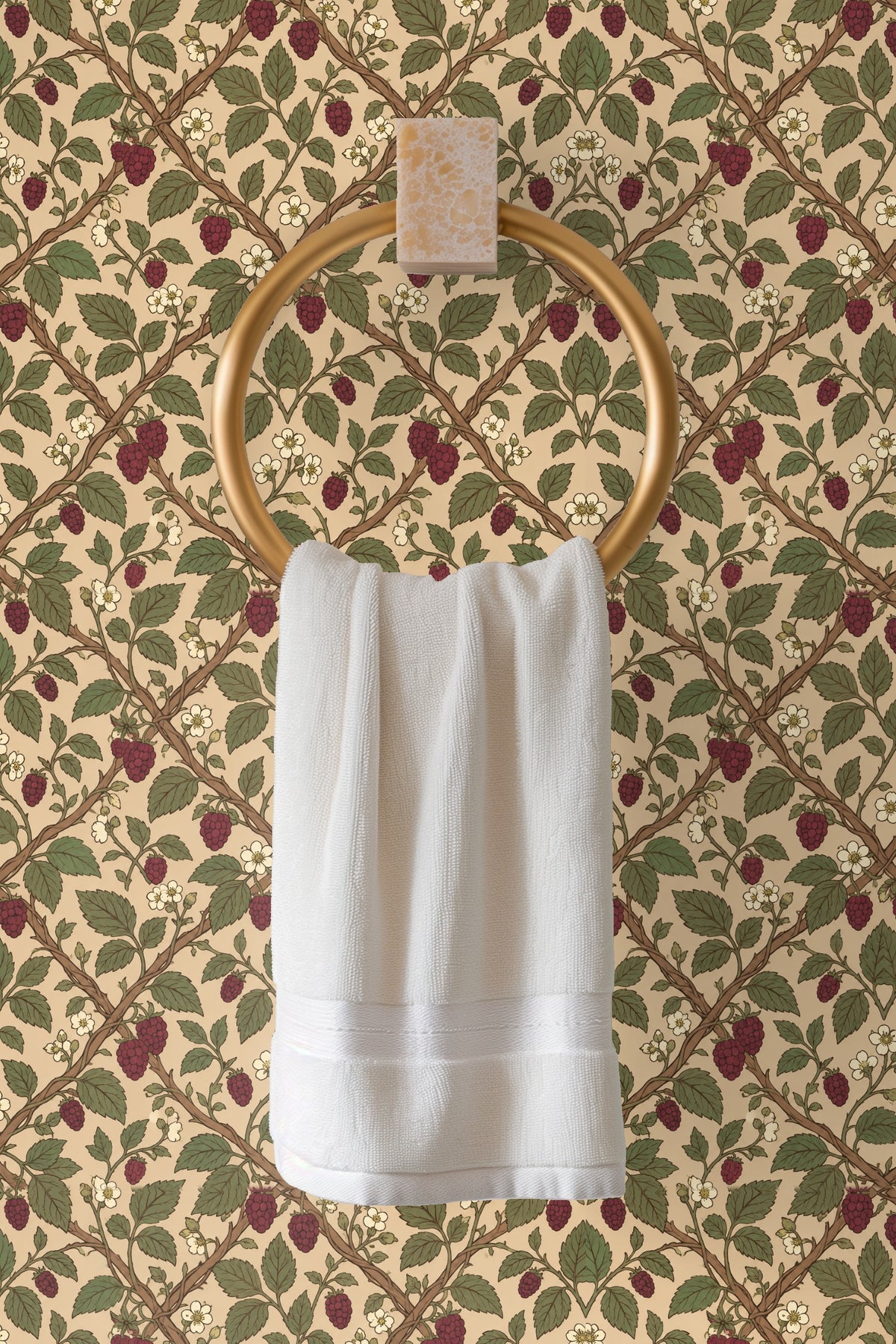 Corner perspective showing Mulberry Trellis wallpaper meeting white trim.