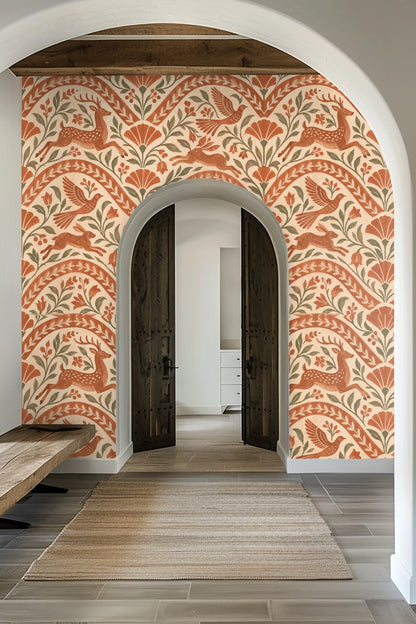 Detail of terracotta wallpaper showing running deer and floral design in arches