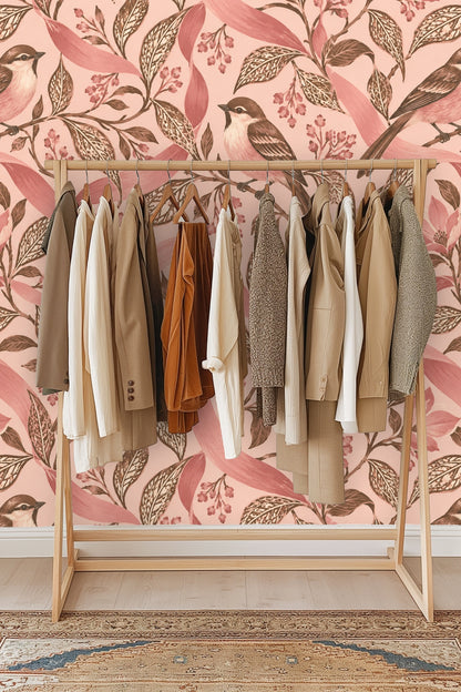 Three finches perched on intertwining leafy branches and blush pink ribbons wrapping among flowers.