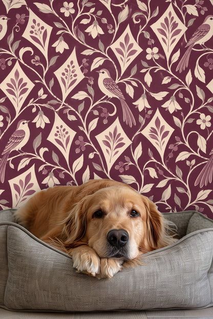 Wallpaper applied in a room with a wooden blanket ladder, showing scale and atmosphere of plum background and botanical pattern.