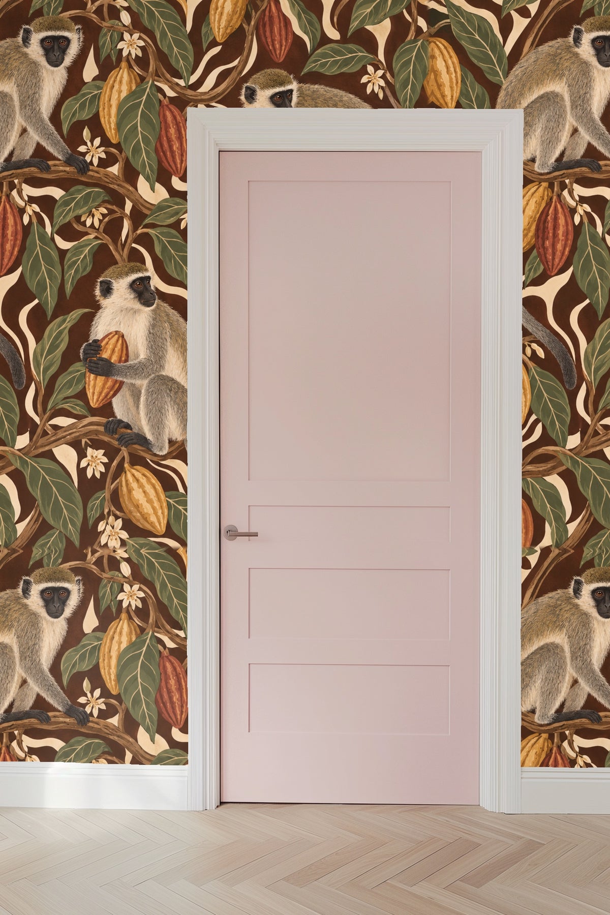 Monkeys perched on cacao branches in rich brown wallpaper design