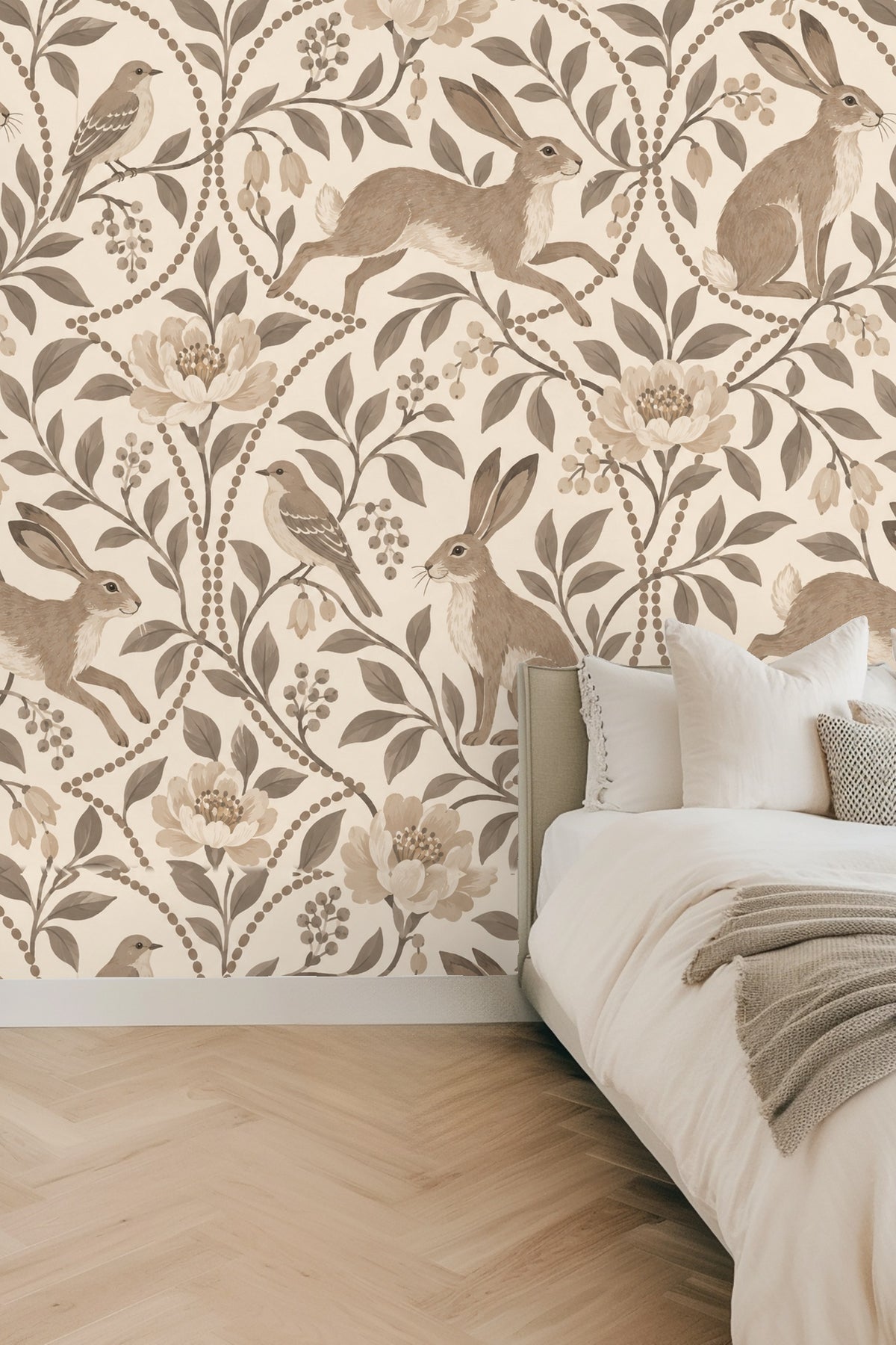 Close-up of wallpaper showing seated hare detail with surrounding floral and bird motifs in beige tones