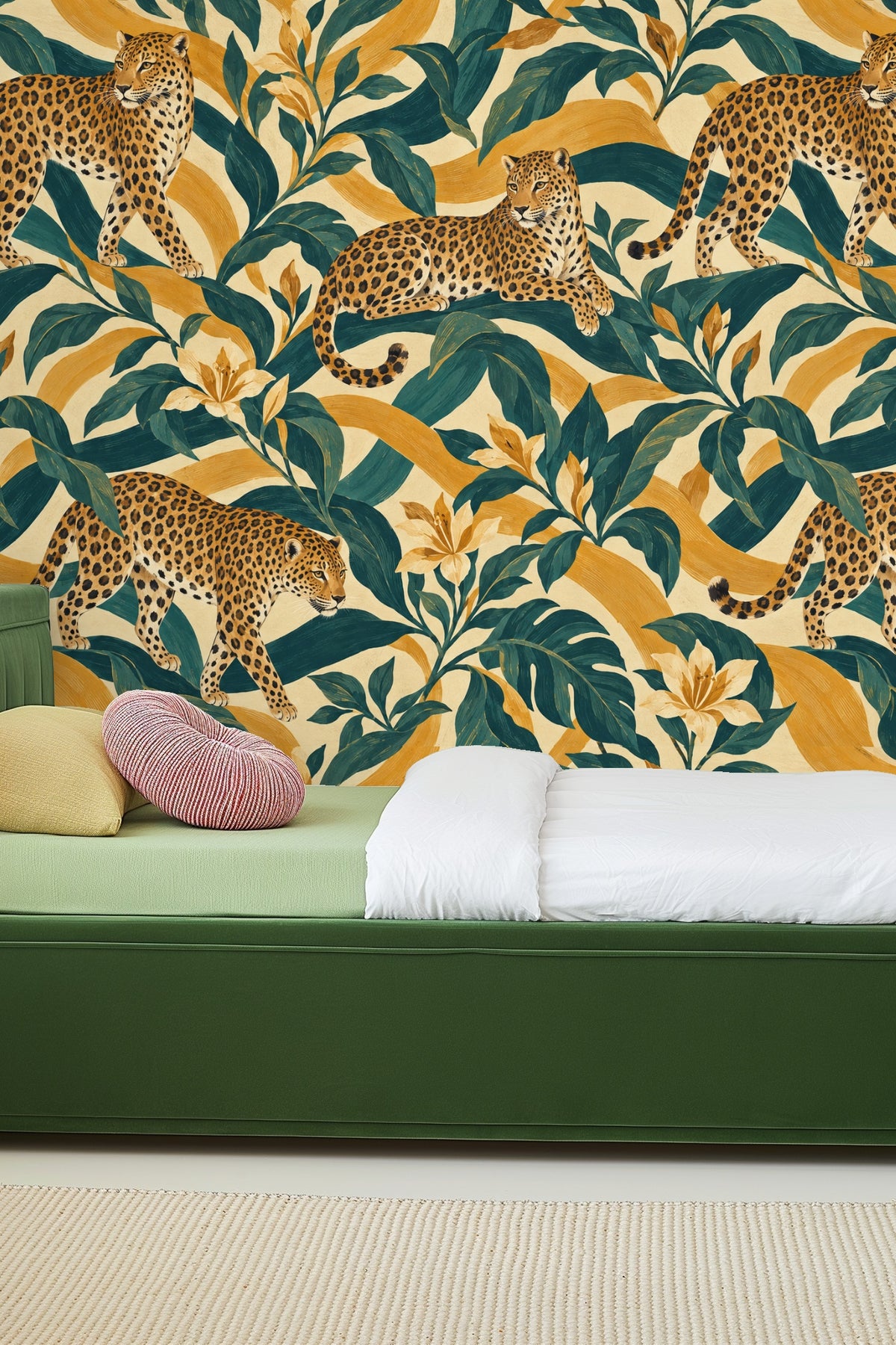 Living room wall with Amber Panther Stripe wallpaper behind a round wooden side table and sofa