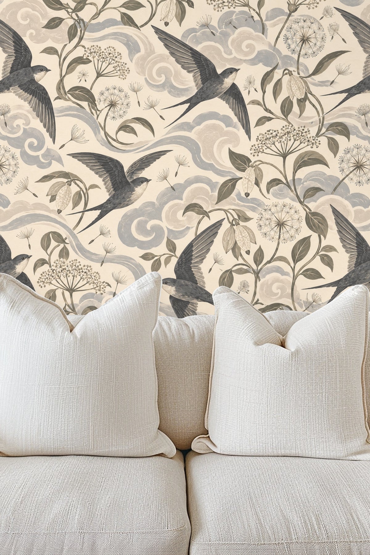 Bedroom with white bedding and Cloudseed Swift Flight wallpaper behind the headboard