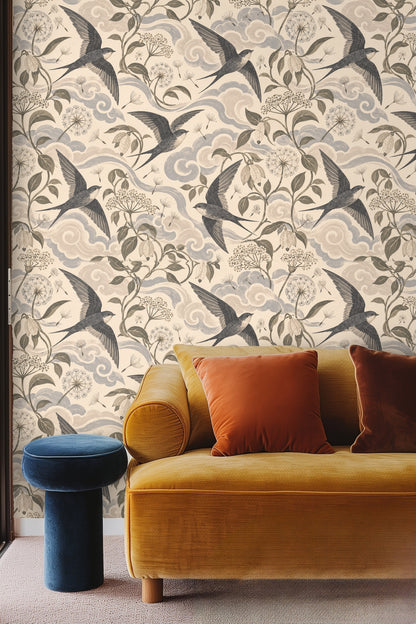 Side angle view of wall covered in swallow and cloud wallpaper