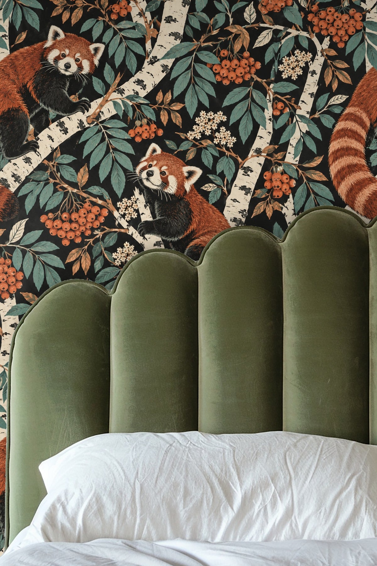 Close-up view of a leather chair and marble side table in front of the Silver Birch Red Pandas wallpaper accent wall.