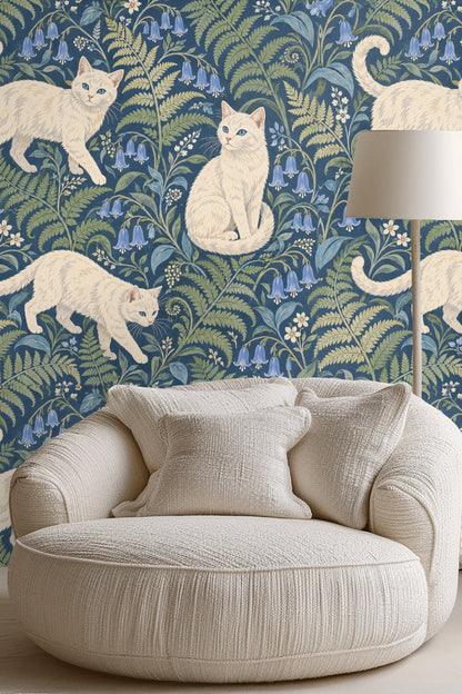 Decorative navy wallpaper showing botanical and feline motifs