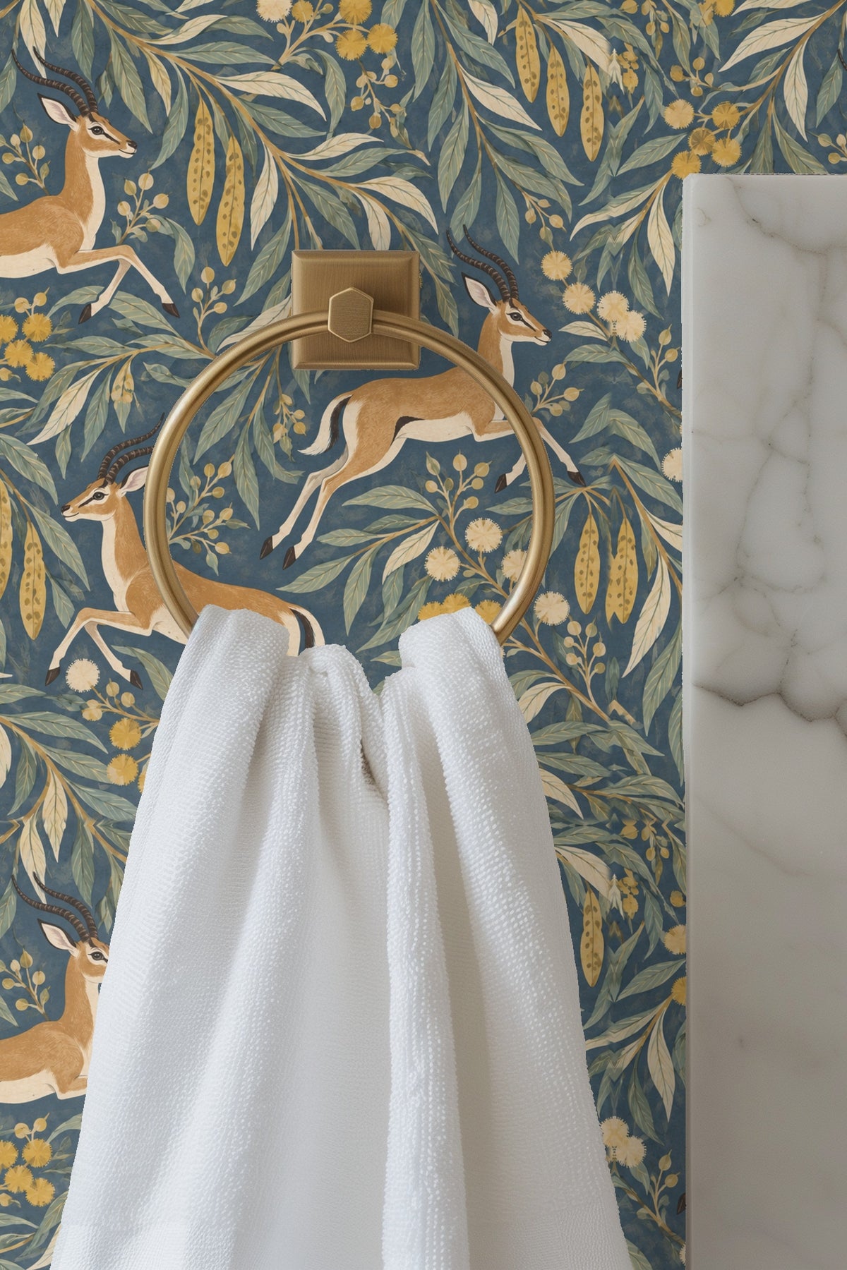 Cluster of ochre and cream floral shapes among green leaves on textured blue background
