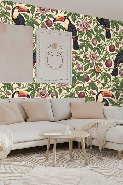Toucans in vibrant black, orange, and yellow sitting on twisting green vines with passionfruits