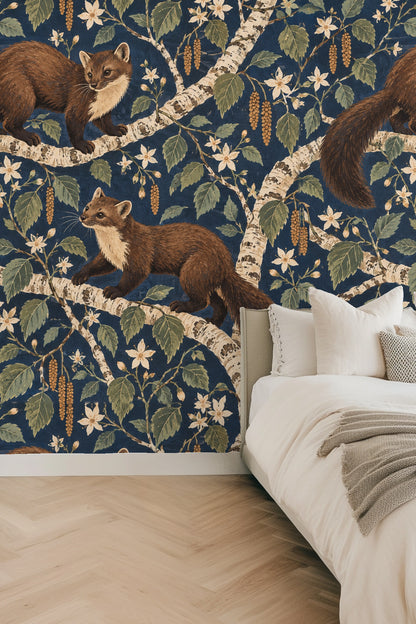 Detailed illustration of two brown martens on white birch branches with green leaves and white flowers on a deep navy background.