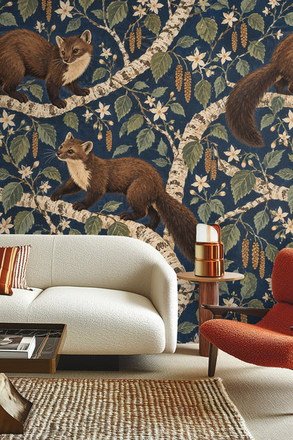 Bedroom wall covered with Starry Birch Martens wallpaper mural showing martens and birch branches with leaves and flower clusters in a deep,