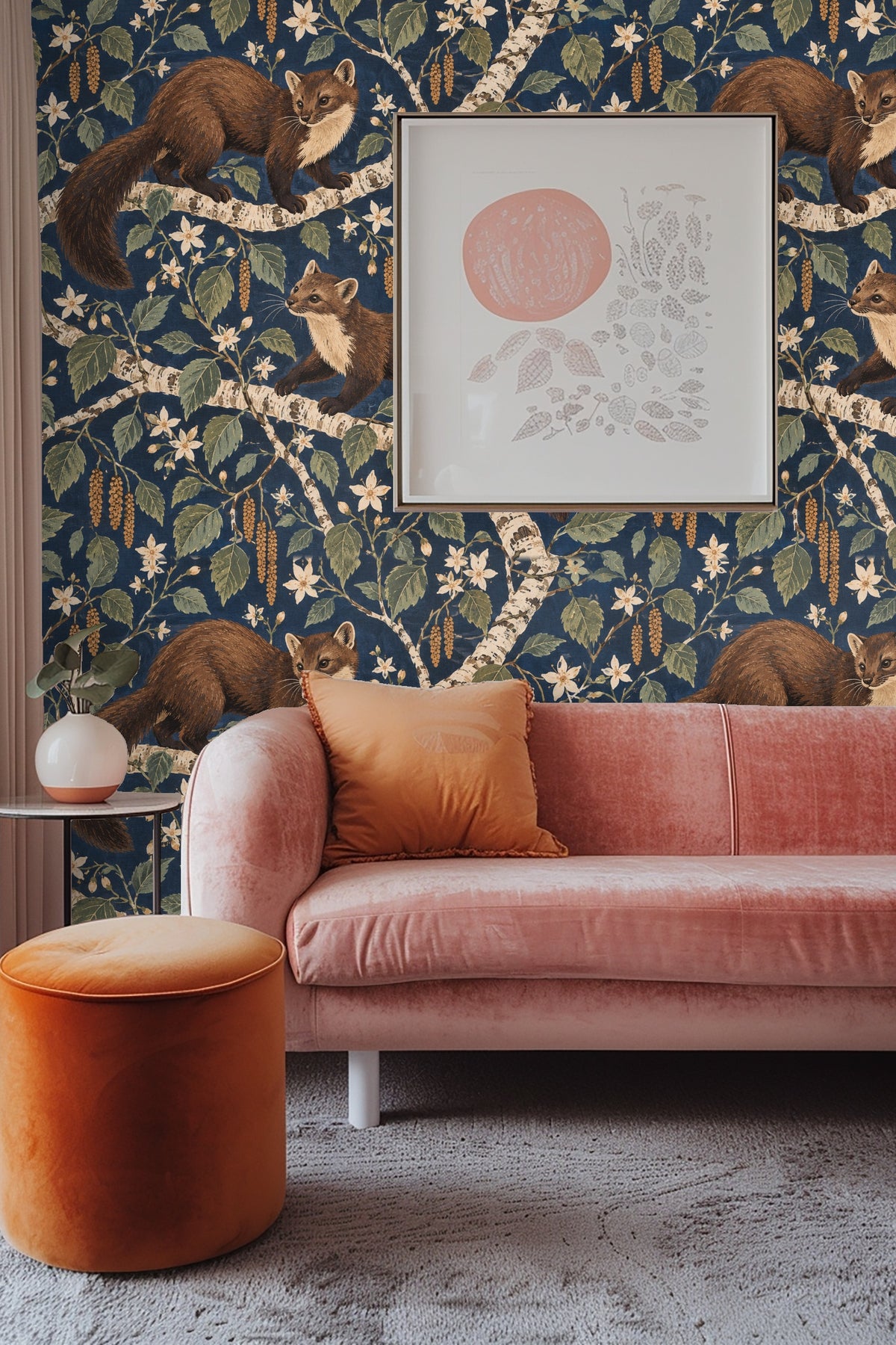 Pattern repeat showing birch branches with hanging catkins and white flowers interspersed with two playful brown martens.