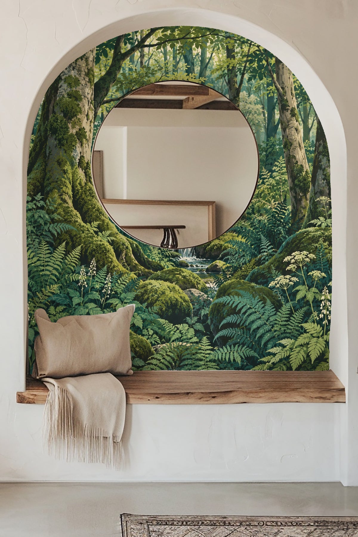 Room scene with a deep blue velvet sofa in front of the Mossy Glade Cascade wallpaper highlighting the lush forest motif.
