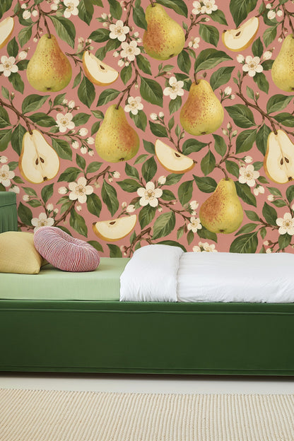 Mid-century modern chair near pear-themed wallpapered wall.