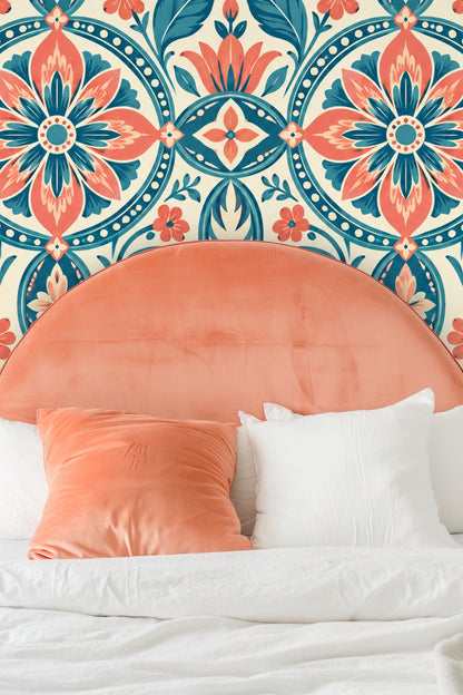 Close-up of wallpaper showing coral and teal floral medallions in circular patterns