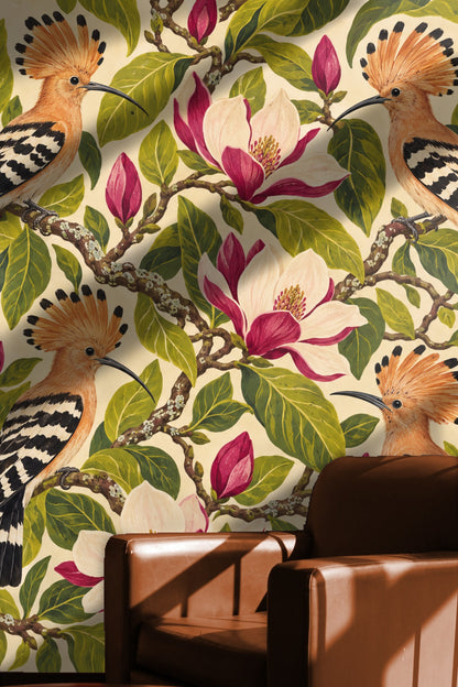 Detailed view of vibrant pink magnolia flowers with green leaves on a light background in wallpaper pattern.