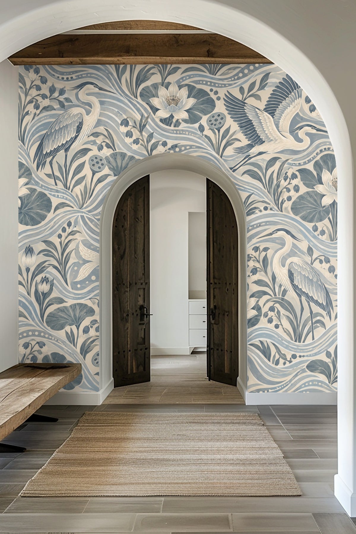 Closeup of blue heron koi flow wallpaper next to a rich blue velvet couch