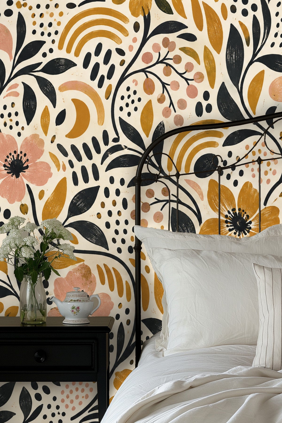 Contrast between deep black ink leaves and ochre flower centers