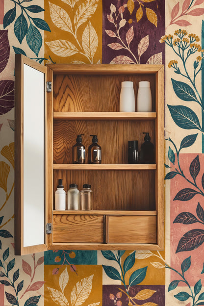 Laundry room scene featuring Orchard Block Botanicals wallpaper behind a window and wooden countertop with laundry machines below