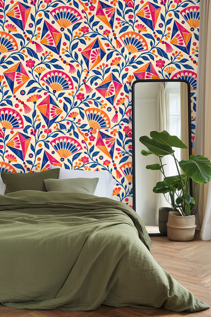 Orange and pink fan-shaped blossoms paired with blue foliage in the wallpaper pattern.